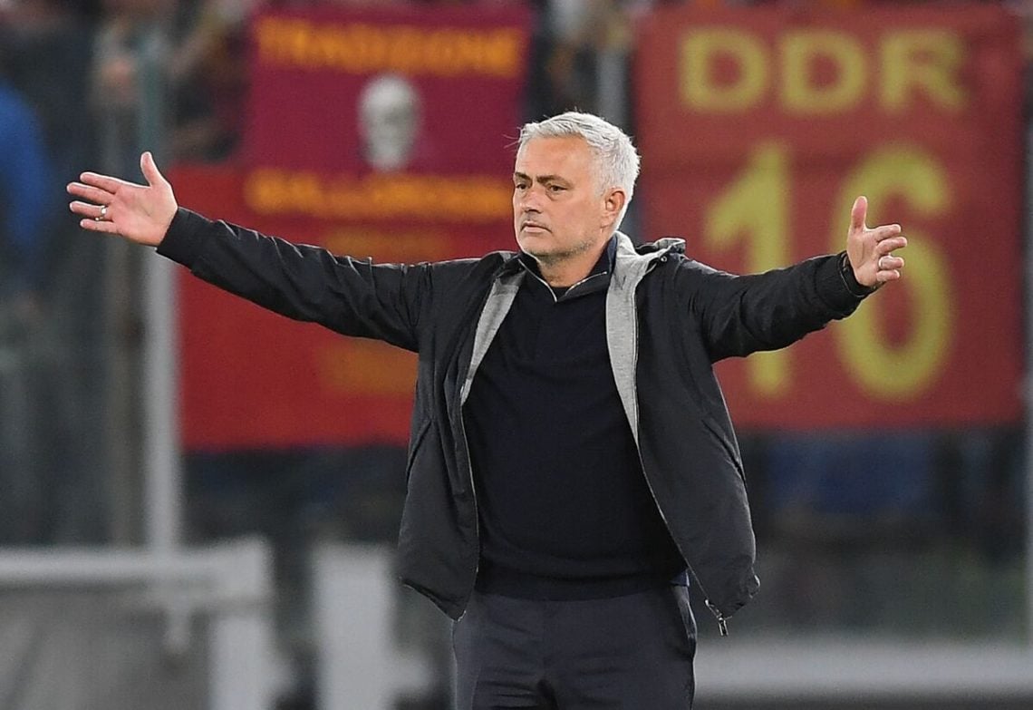 Jose Mourinho with his arms outstretched.