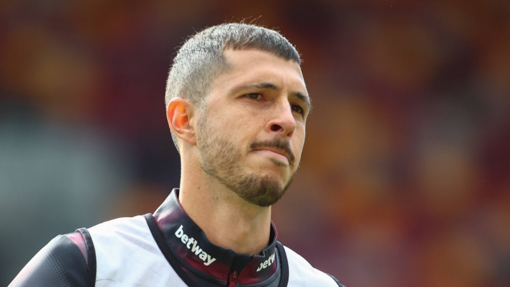 West Ham midfielder Guido Rodriguez warming up for a game.