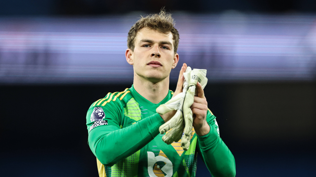 West Ham goalkeeper Mads Hermansen applauds.