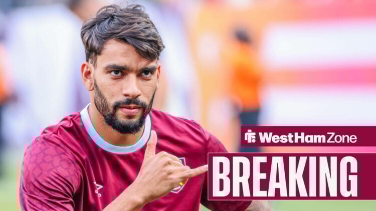 Lucas Paqueta does a hand gesture in his West Ham training kit.
