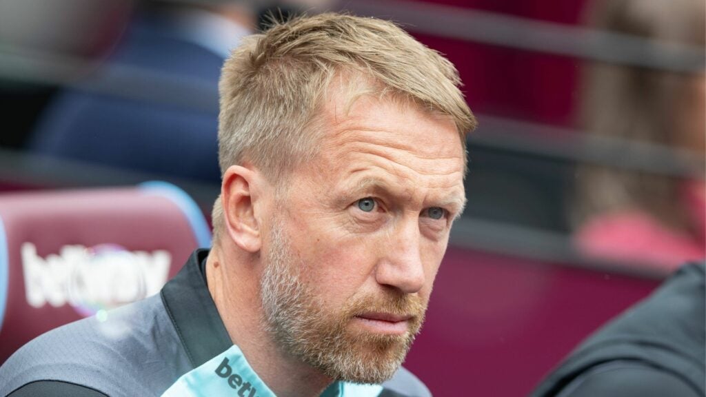 Graham Potter looks curiously in the West Ham dugout.