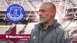Nuno Espirito Santo on the right looking the the left with the Everton badge on the left and the London Stadium in the background.