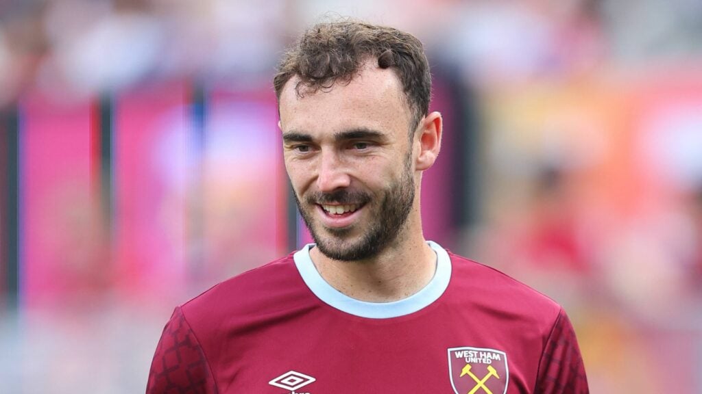 Andy Irving smiling while wearing West Ham training gear