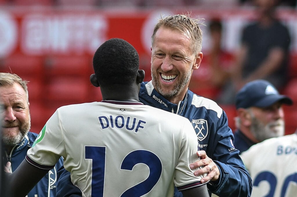 Graham Potter and El Hadji Malick Diouf celebrating after West Ham beat Nottingham Forest
