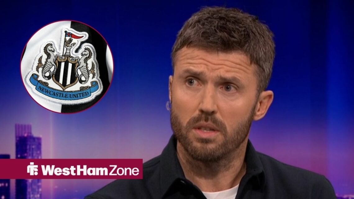 Michael Carrick looking at Newcastle badge.