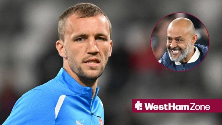 Nuno Espirito Santo looks delighted in the direction of Tomas Soucek.