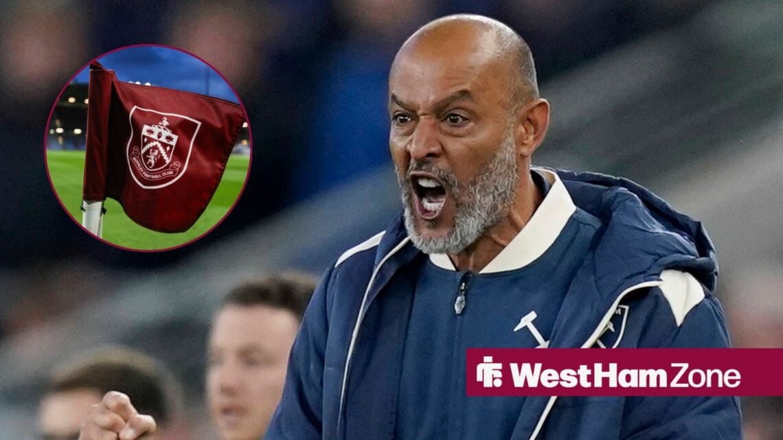 Nuno Espirito Santo shouting with Burnley flag in corner