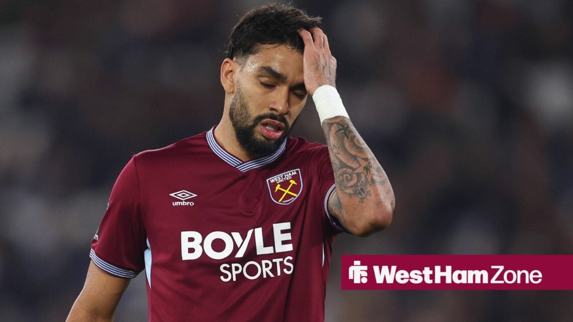 Lucas Paqueta with his head in his hand.