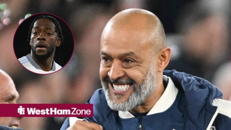 Nuno Espirito Santo smiling with Axel Disasi