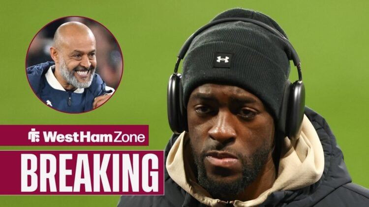 Nuno Espirito Santo smiling in the direction of Axel Disasi.