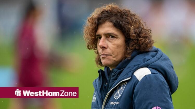 West Ham Women boss Rita Guarino looks on