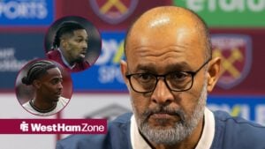 West Ham manager Nuno Espirito Santo looking at two of his players, Crysencio Summerville and Adama Traore.