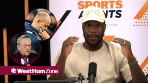 Michail Antonio looking centrally while David Sullivan and Nuno Espirito Santo are next to him on the left.